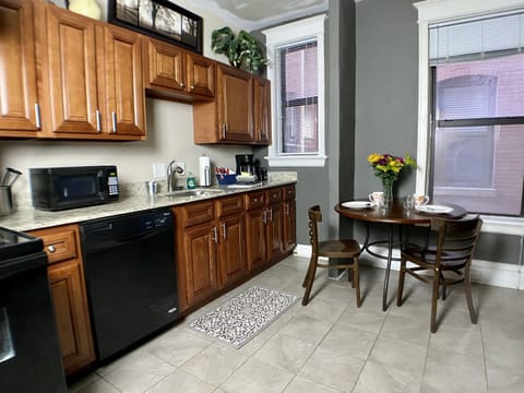 Eat-in kitchen with bakeware and cookware