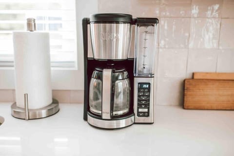 Elevate your coffee game with us: this sleek and versatile coffee maker offers a brewing option to suit every coffee lover's taste.