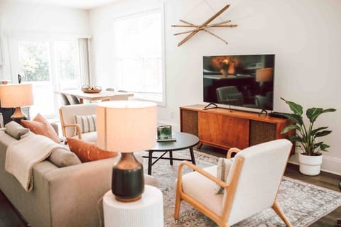 Plenty of seating is available on the sofa and the chairs, making this the perfect place to spend time with the whole family. Watch a show on the 60” TV, with cable with a sports package so you never have to worry about missing the game!