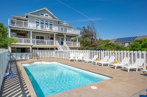 Private pool with plenty of lounge seating for relaxing and soaking up the sun.