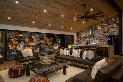 Cozy living room with an access to the pool