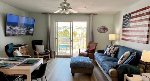 Comfortable living-dining area opens onto private deck