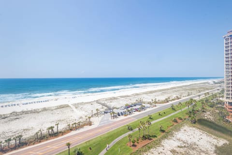 Sun-soaked beachfront views, emerald lawns, and endless stretches of white sand meeting the bright blue Gulf waters.