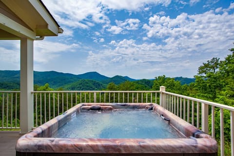 Unwind in the hot tub with incredible mountain views all around.