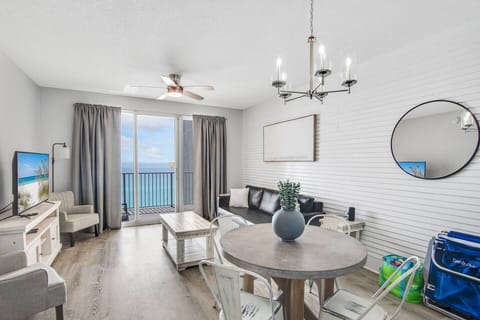 This 2020 Complete Remodel features a bright and open living and dining space with tall ceiling, Gulf views, and new furniture with modern decor around a large 55" Smart TV for all your streaming needs!