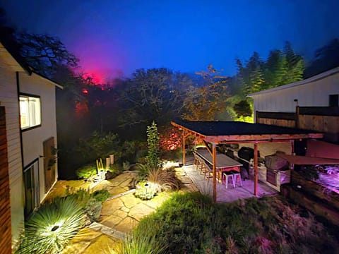 Upscale Outdoor kitchen with dining area