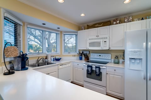 Well stocked kitchen with Keurig coffee maker