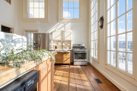 Chef's dream kitchen with sunlight pouring through.