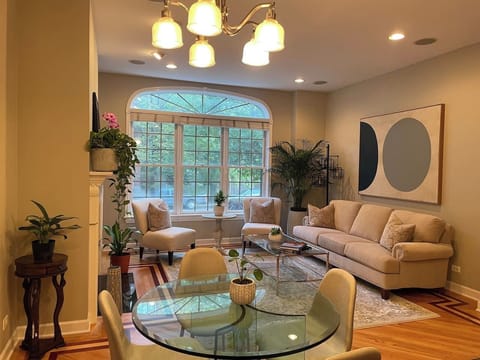 Spacious living room designed for group gathering.