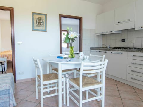 Furniture, Property, Cabinetry, Table, Picture Frame, Countertop, Azure, Wood, Chair, Interior Design