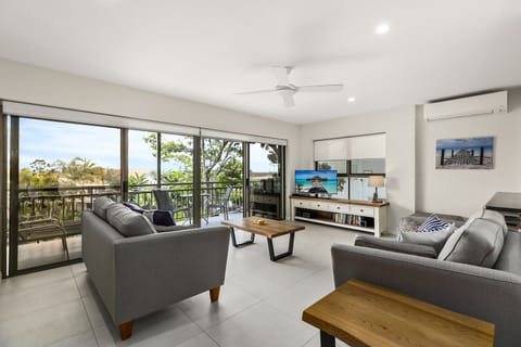 Living area out to balcony with views