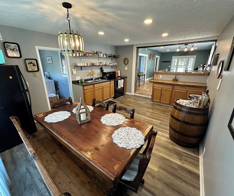 Comfortable dining table where you can overlook the creek. 