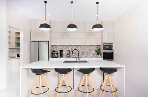 Villa | Private kitchen | Fridge, microwave, oven, stovetop