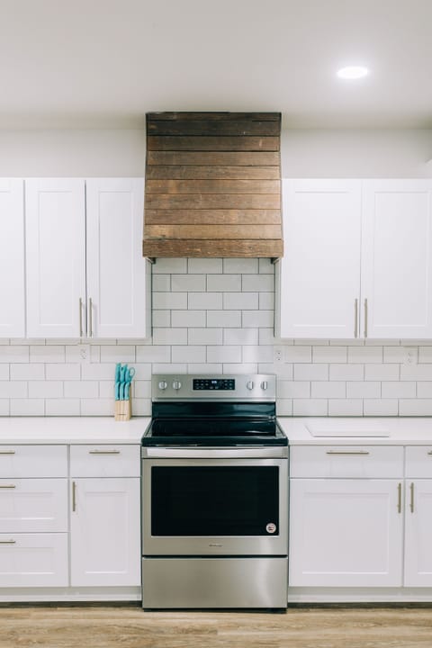 Oven with beautiful range made of repurposed wood from the house
