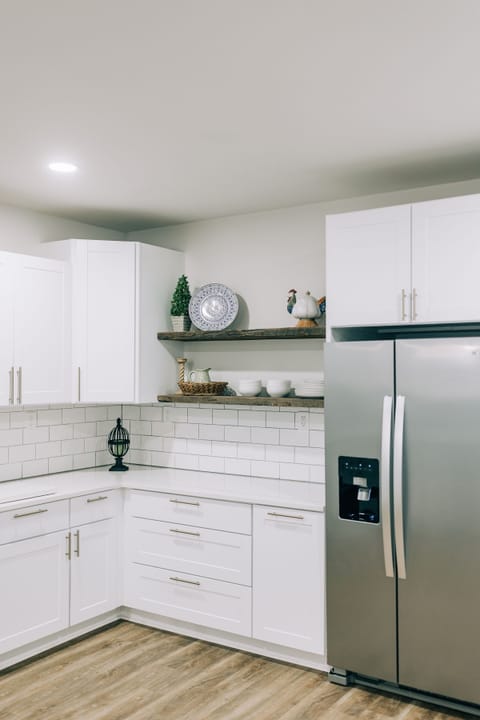 tons of cabinets and cooking space.