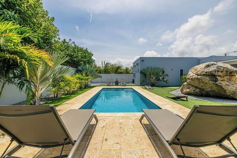 Dive into paradise with your large private pool, perfect for cooling off under the Caribbean sun or enjoying a refreshing evening swim.