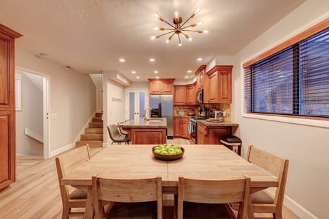 Dining Area: Gather around the sunlit table, perfect for hearty meals and laughter!