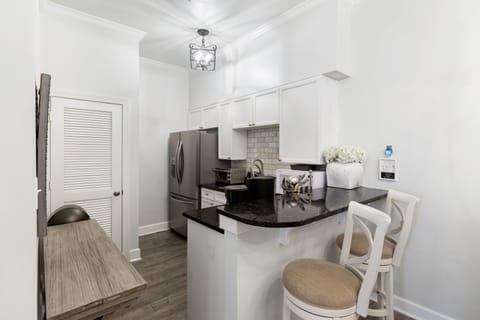 Kitchen area with bar seating