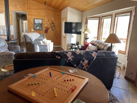Game table with seating for 4. Two bedrooms/ 2 bathrooms down the hallway 