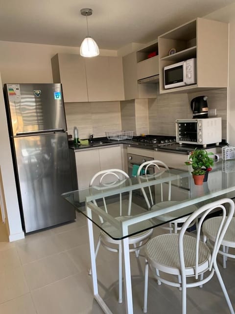 Apartment | Private kitchen | Freezer, dining tables