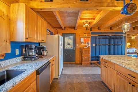 Full kitchen includes refrigerator, stove top, oven, microwave, dishawasher, and more!