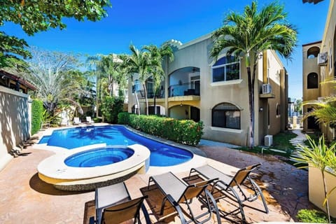 Tamarindo vacation rental with shared pool in Langosta Beach—just a short walk to the sand and surf, this tranquil garden setting offers the perfect spot to unwind after exploring Playa Tamarindo, dining out, or enjoying nearby beach activities.