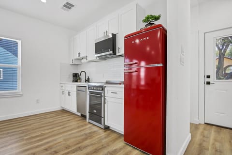 An added pop of color from the vintage style fridge