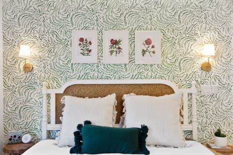 Serena and Lily wallpaper. King bed. Sound machine. Blackout blinds. En Suite