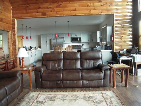 Recliner ended sofa in front of kitchen