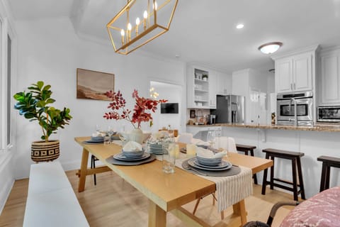 Chef's kitchen offers a double oven, an oversized microwave, and a big refrigerator for the entire family.