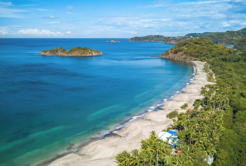 Playa Penca is one of a few white sand beaches in CR and has guarded parking.