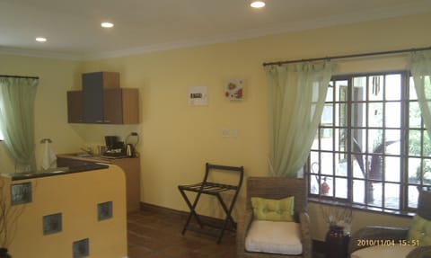 Superior Double or Twin Room, Kitchenette, Pool View | Living area | 32-inch flat-screen TV with digital channels, TV, Netflix