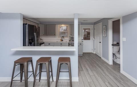 Bar seats 3 people for a total of 6 seats (max number of guests).