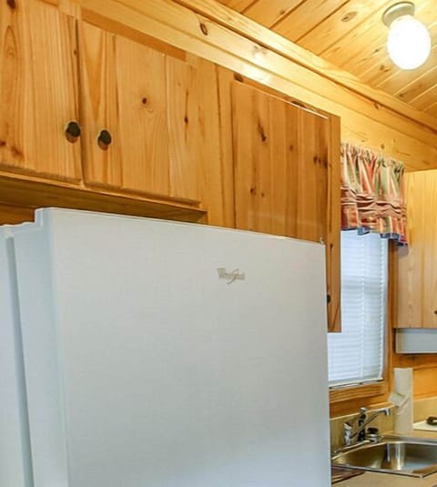 Cabin, 1 Bedroom, Non Smoking (Linens Included) | Private kitchen | Dining tables