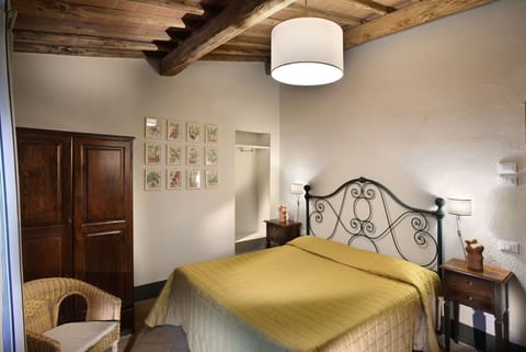 agriturismo-la-papessa-chianti-san-donato-farmhouse-melograno-bedroom