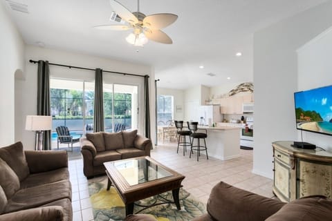 Villa, 4 Bedrooms | Living area | TV, foosball