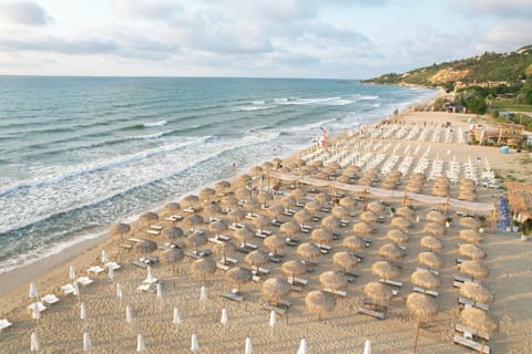 Private beach, sun loungers, beach umbrellas, beach bar