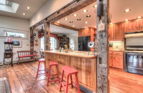 Prepare dinner for your family while they relax in the living room playing games, watching a movie, or spoiling their appetite with fresh popcorn.