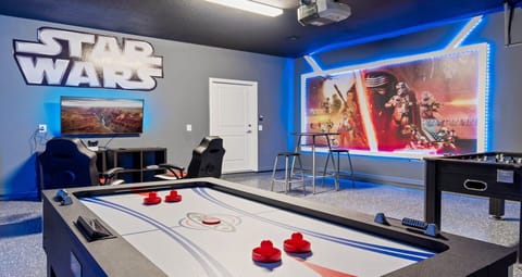 Game Room: Stylishly furnished with a Star Wars theme and cool lighting.