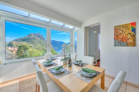 Family Apartment, 2 Bedrooms, Refrigerator & Microwave (Residenza Parco Carona with Lake-View) | Dining