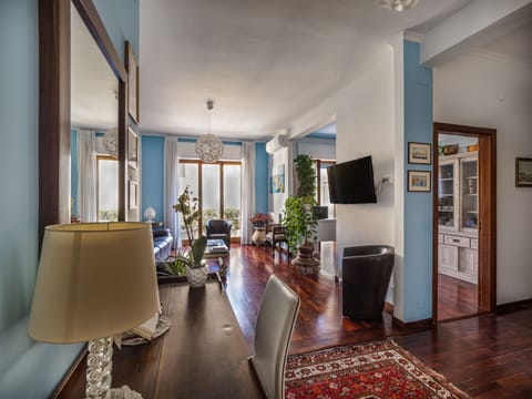 Executive Condo | Living area | 38-inch flat-screen TV with cable channels, TV