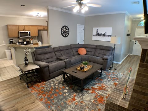 Living Room. Each end of the sectional is an electrical controlled recliner.