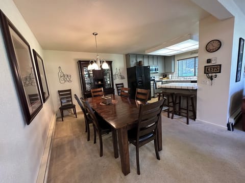 Dining room with extra large table with seating for up to 12.
