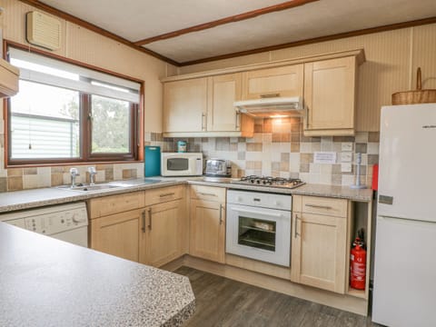 Fridge, electric kettle, toaster, cookware/dishes/utensils