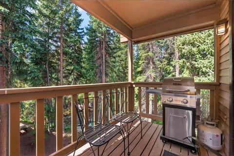 Nestled among the trees, your covered balcony offers forest views and a private BBQ—perfect for grilling al fresco and unwinding in the fresh mountain air.