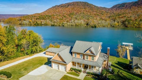 Stunning aerial view of Main & Guest home along the TN river
