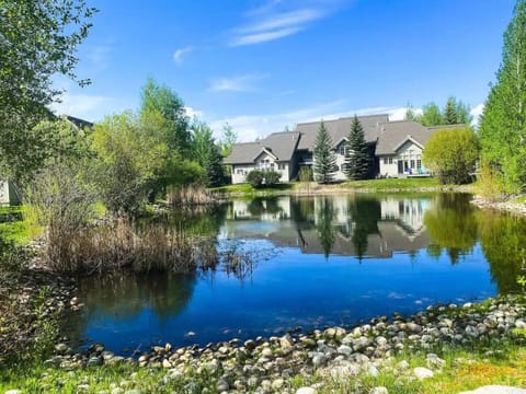 Enjoy a gorgeous view behind the townhome — the pond looks great in all seasons!