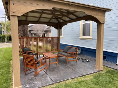 Nice outside sitting area with bbq and gas fire pit under the gazebo!