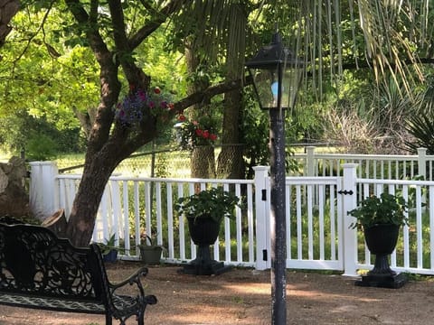 Shaded Benches for sitting near the waterfall and gated area for your pet
