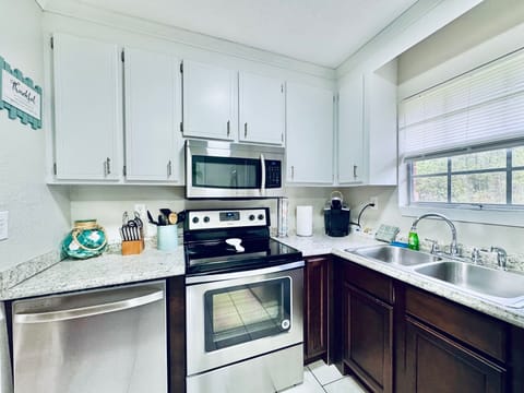 Full Kitchen with Coffee maker, Stove, Fridge, and Dishwasher